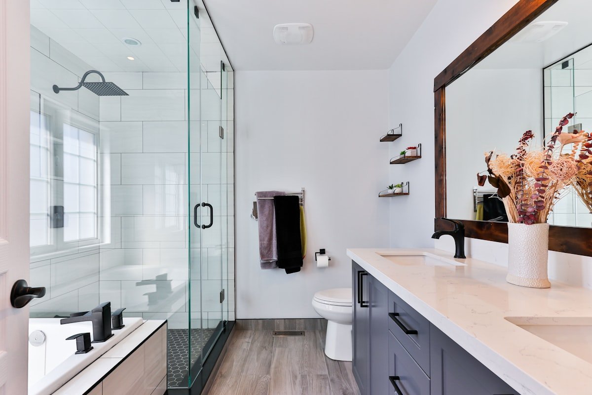 Architectural Bathroom Fixtures: Choosing Solid Brass Diverters & High-Flow Overhead Showers